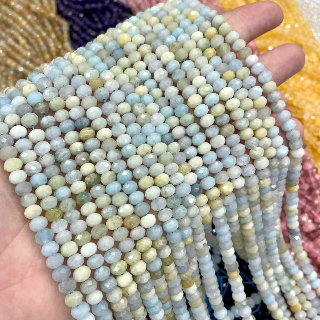 อคามารีน (Aquamarine) ทรงล้อรถ เจียเหลี่ยมเหลี่ยม 6x4 mm เส้นยาว