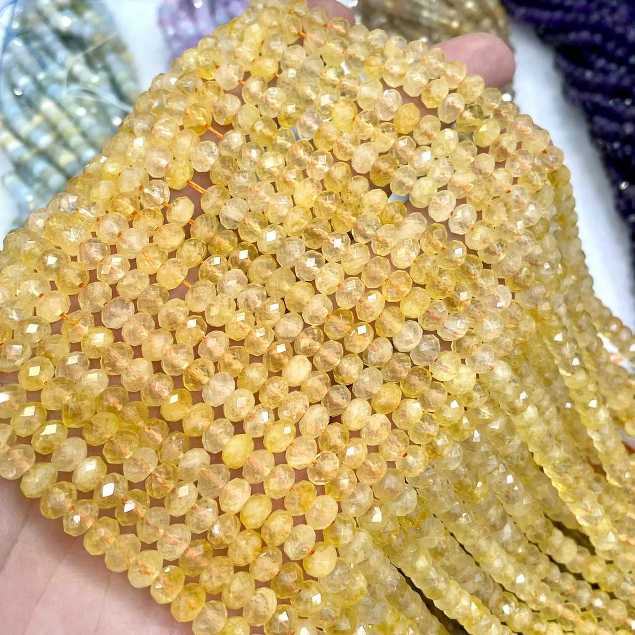 ซิทริน (Citrine) ทรงล้อรถ เจียเหลี่ยมเหลี่ยม 6x4 mm เส้นยาว