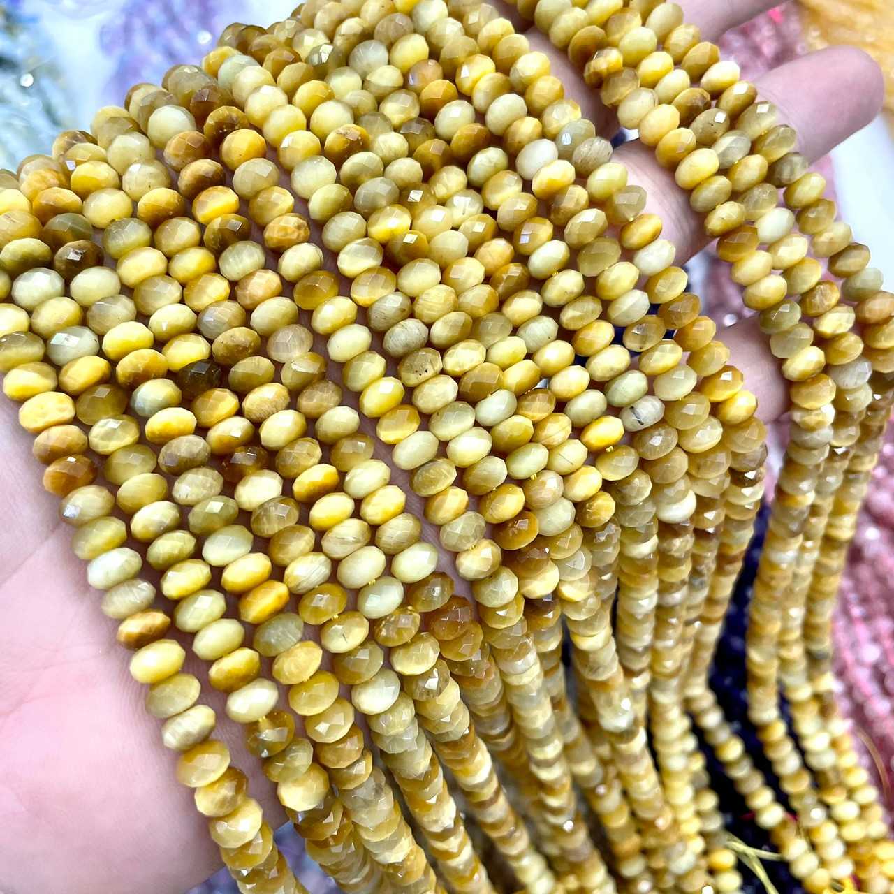 ตาเสือทอง (Gold Tiger Eye) ทรงล้อรถ เจียเหลี่ยมเหลี่ยม 6x4 mm เส้นยาว