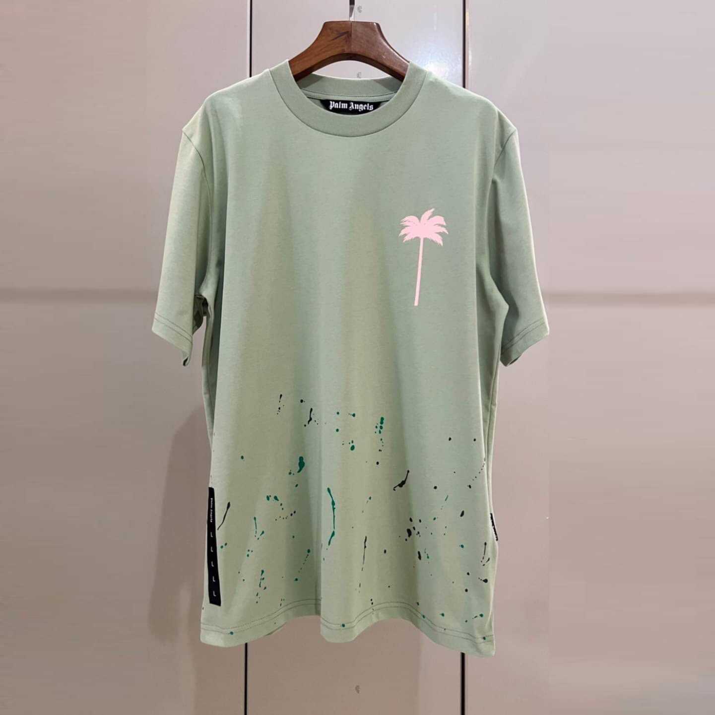 PALM ANGELS PALM TREE PAINTED SPLATTER LOGO PRINT T-SHIRT PASTEL GREEN เสื้อปาล์มแองเจิล
