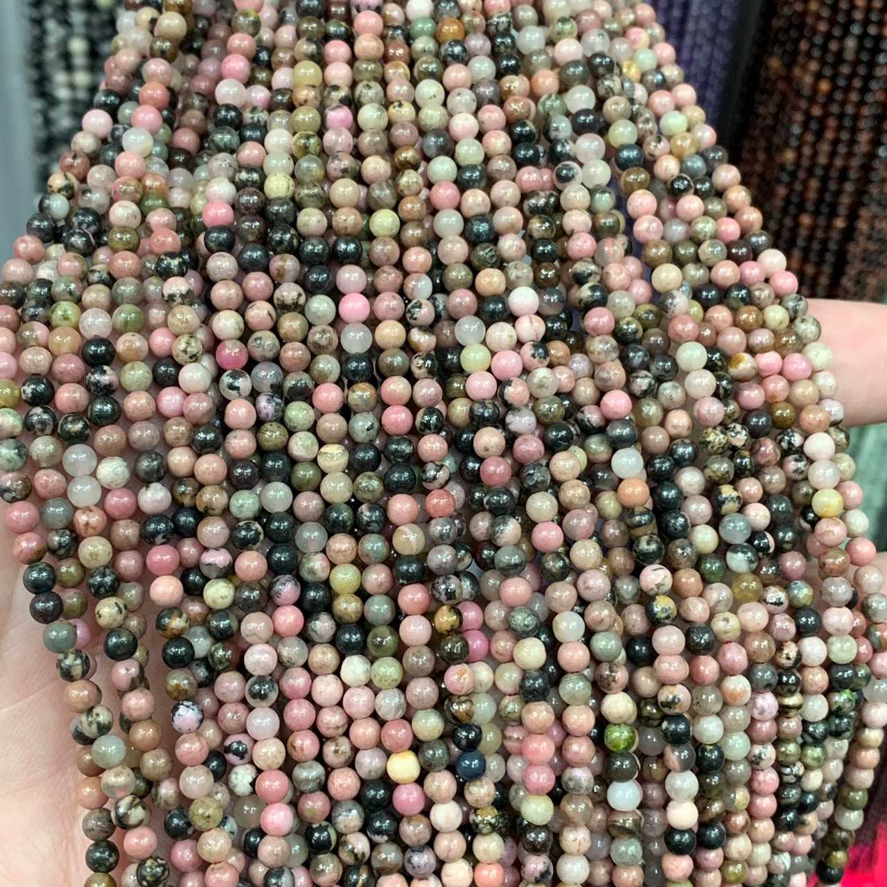 โรโดไนท์ ลายดำ (Rhodonite) 3 mm ทรงกลม เส้นยาว