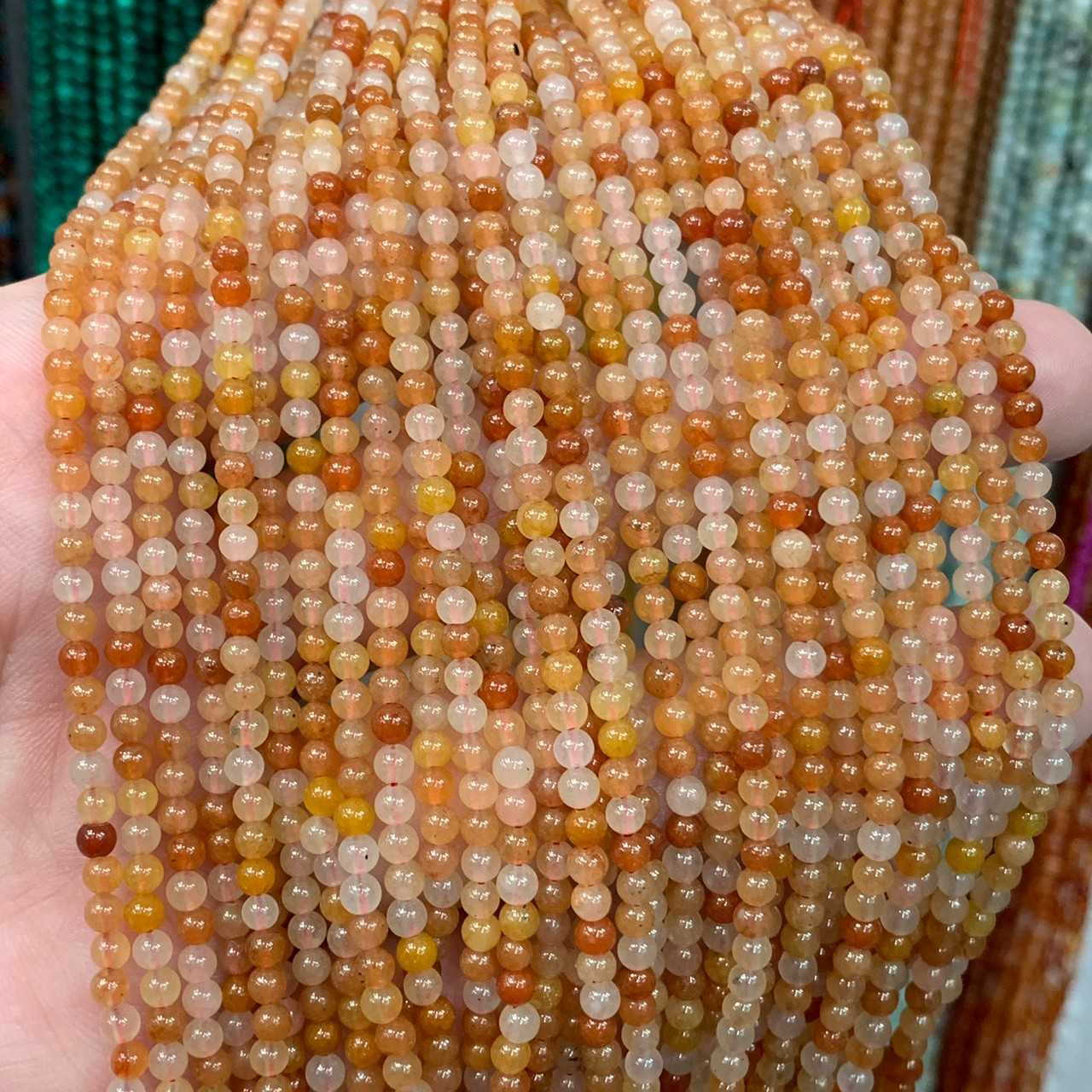 หยกส้มพม่า (Orange Jade) 3 mm ทรงกลม เส้นยาว
