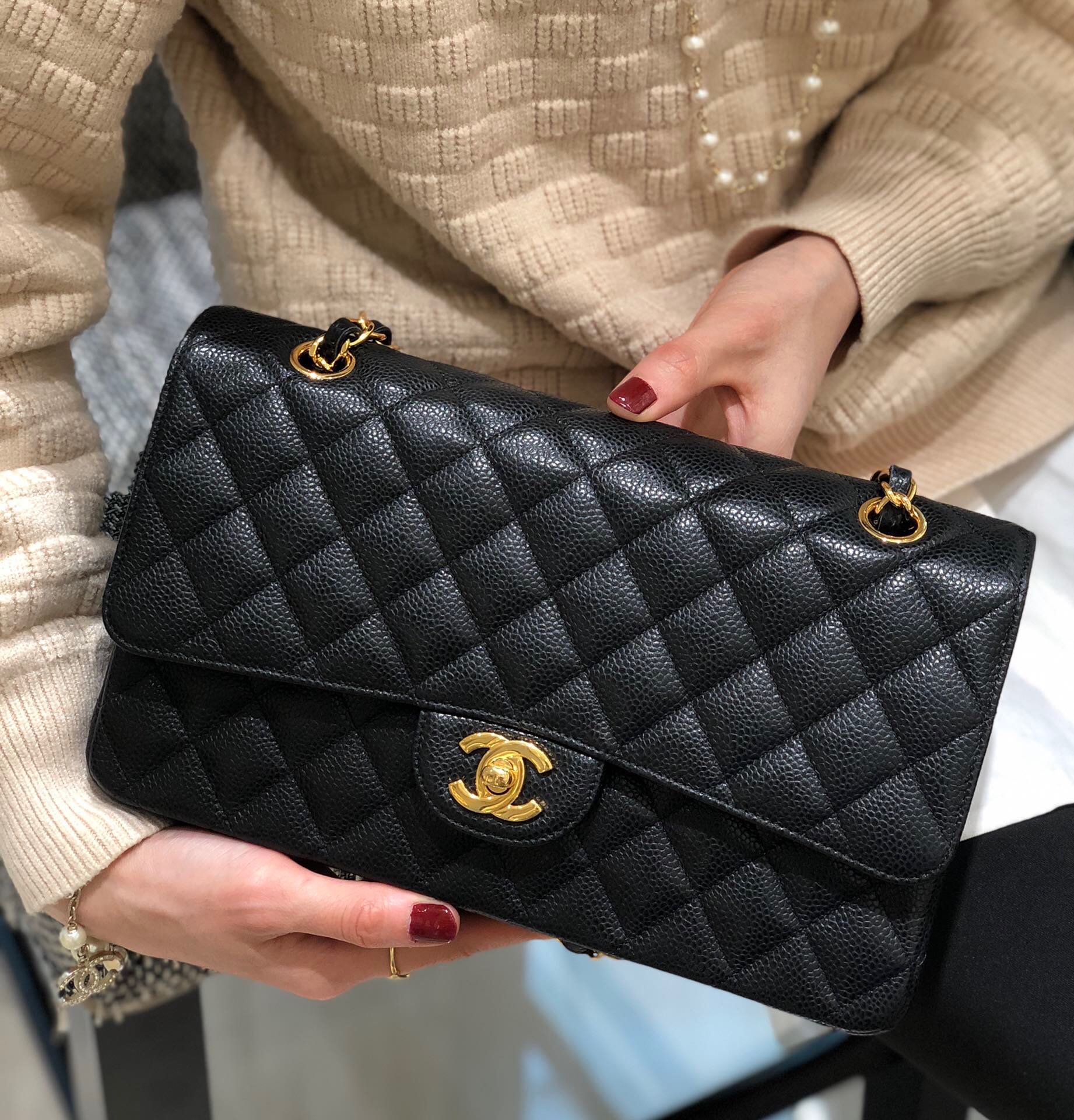 CHANEL classic medium black caviar gold hardware