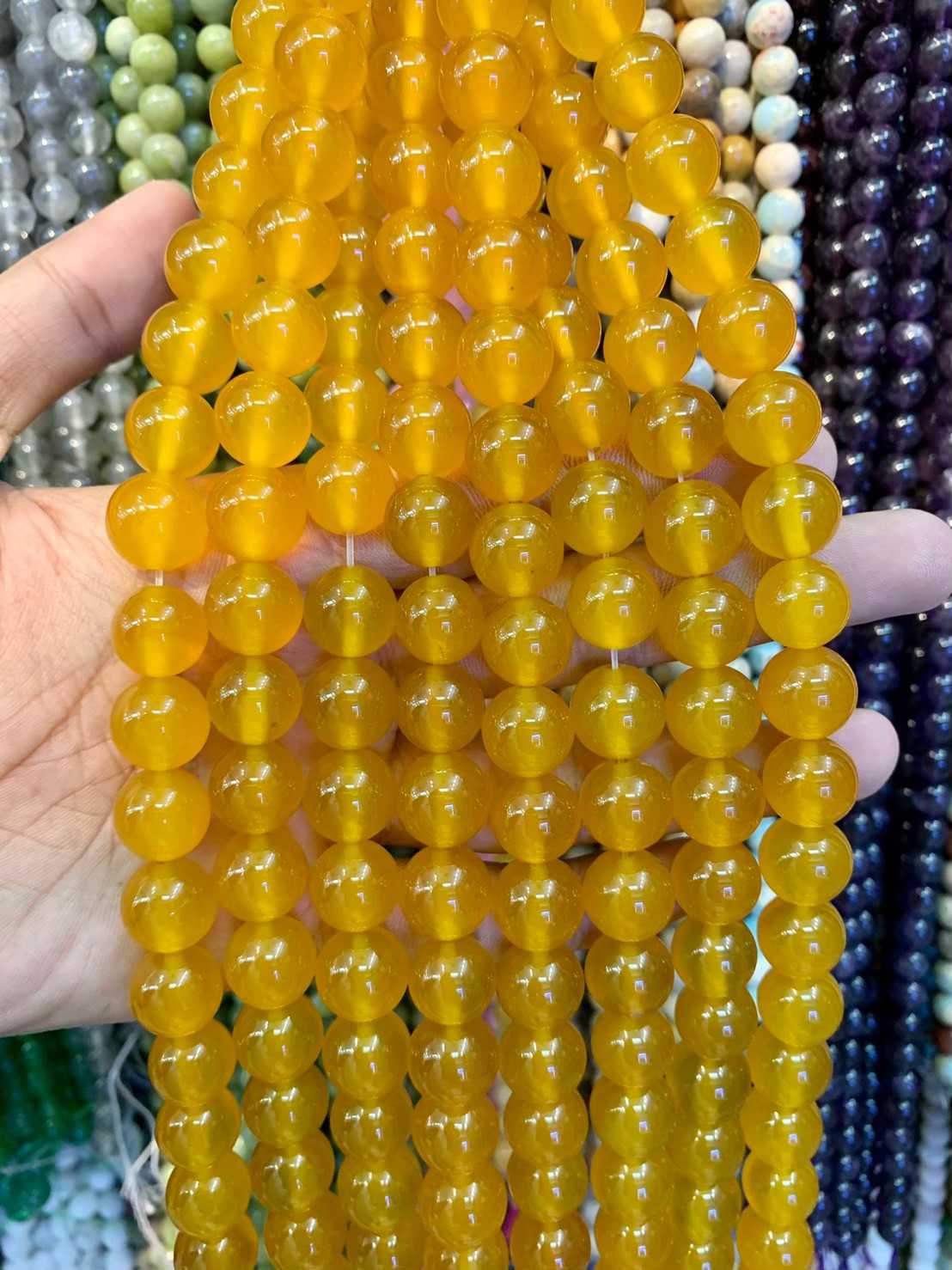 คาซิโดนี สีเหลือง (Yellow chalcedony)ทรงกลม เส้นยาว