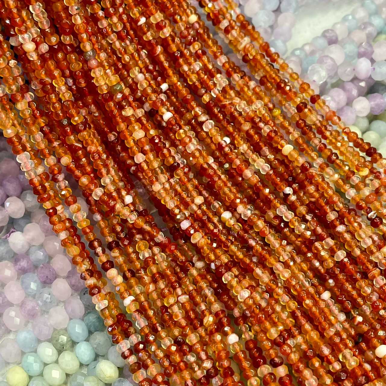 อาเกตส้ม (Oragne Agate) 3x2 mm ทรงล้อรถ เจียเหลี่ยม เส้นยาว
