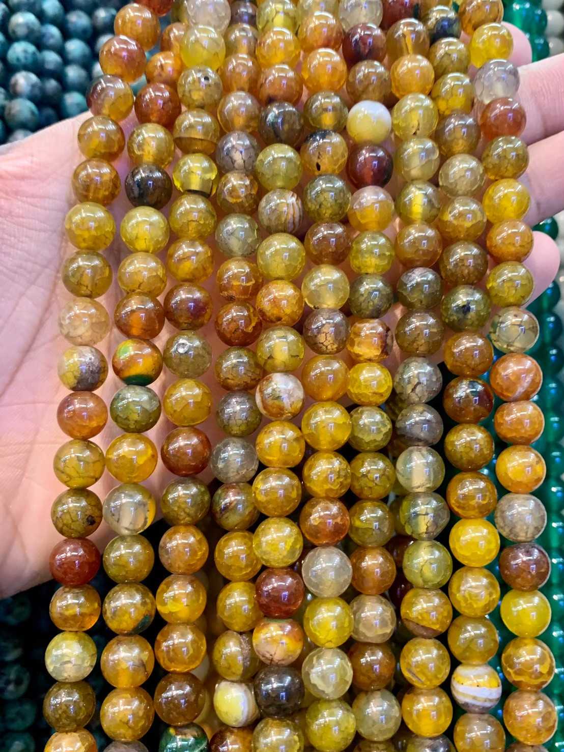 เกล็ดมังกร สีเหลือง (Yellow Cracked Agate) ทรงกลม เส้นยาว