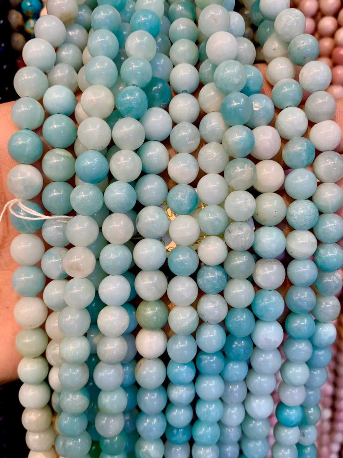 อมาโซไนท์ คัดสี (Green Amazonite) ทรงกลม เส้นยาว