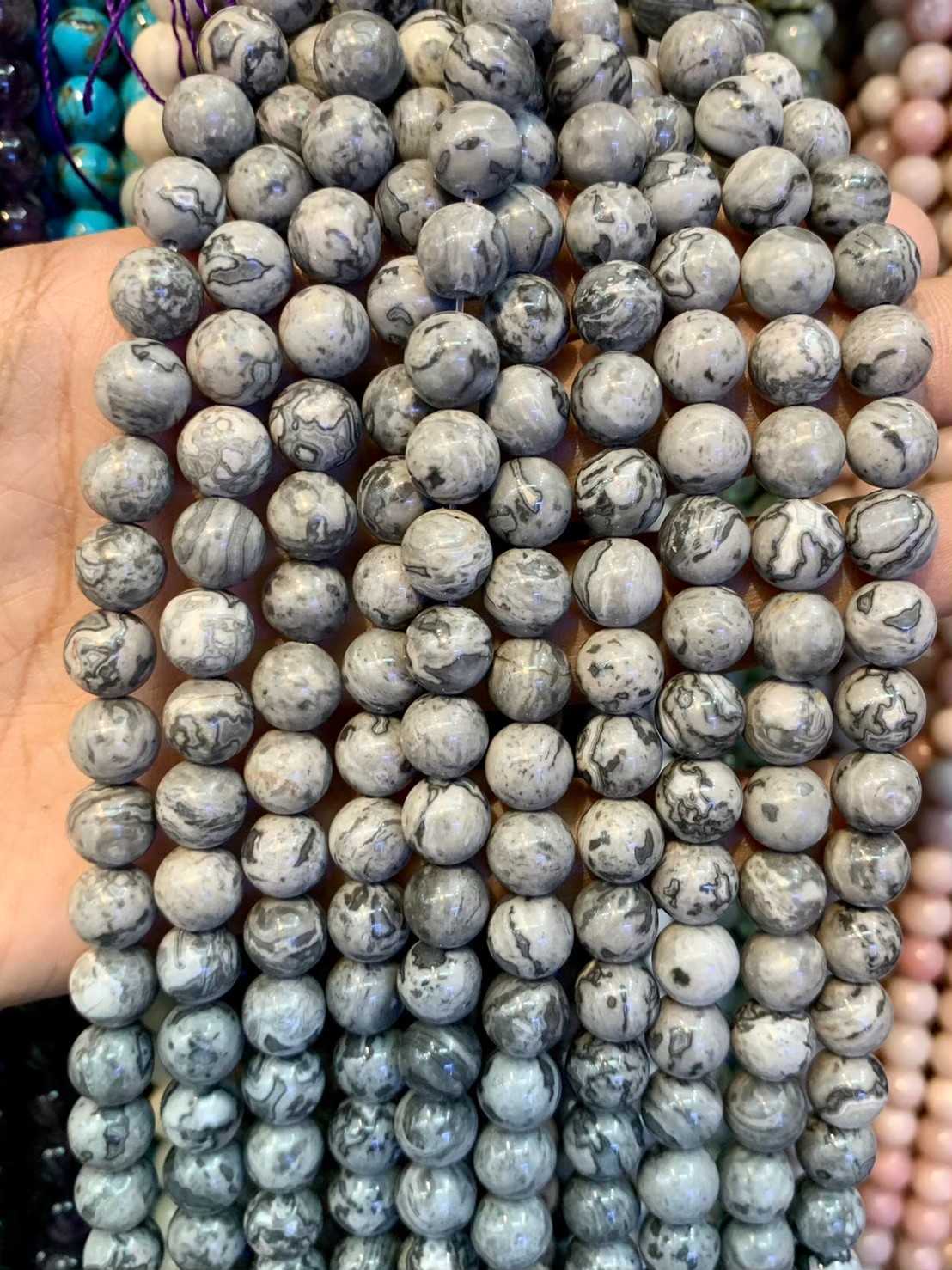 โอเชี่ยน แจสเปอร์ สีเทา (Gray Ocean Jasper) ทรงกลม เส้นยาว