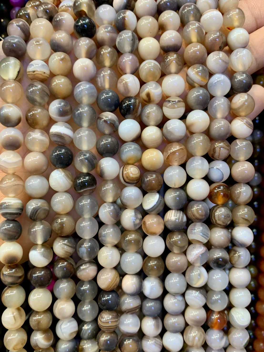 อาเกต บอสวาน่า (Boswana Agate) เกรด AAA ทรงกลม เส้นยาว
