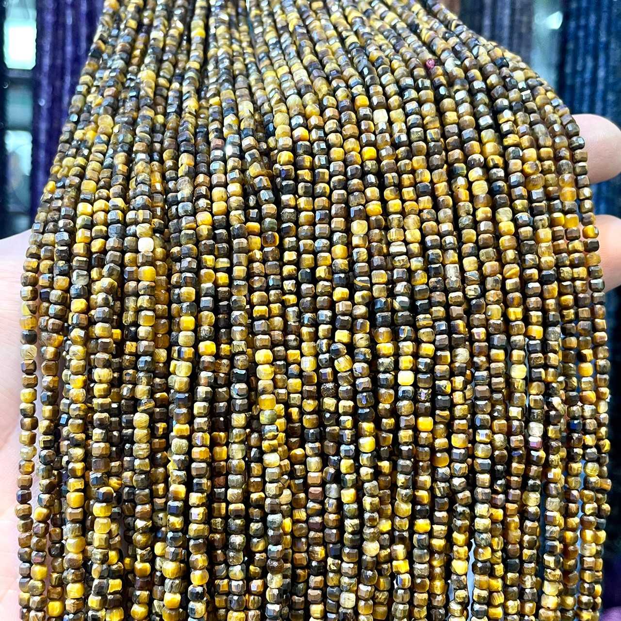 ตาเสือเหลือง (Yellow Tiger's Eyes) ทรงลูกบาศก์ 2x2 mm เส้นยาว