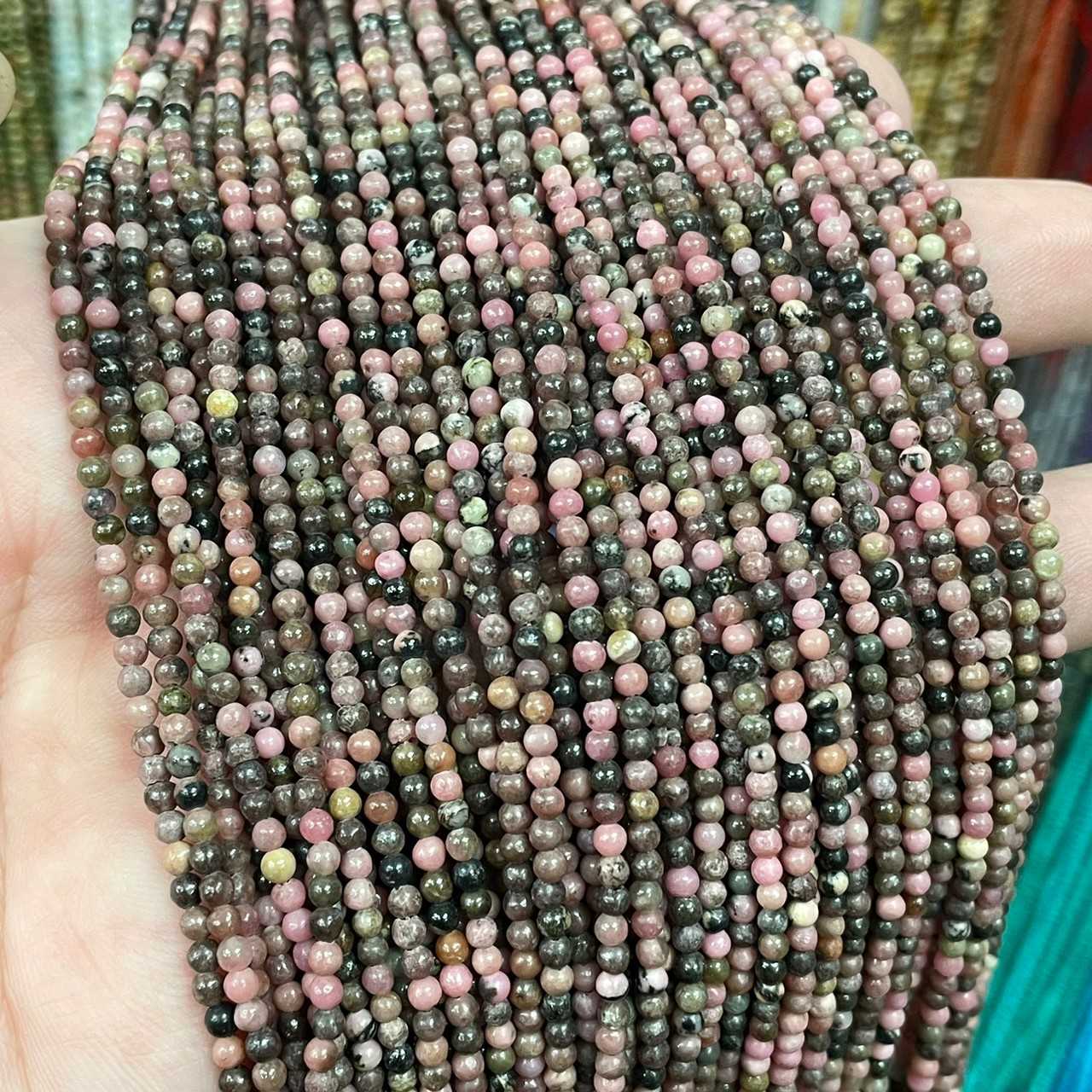 โรโดไนท์ (Rhodonite) ขนาด 2 mm ทรงกลม เส้นยาว