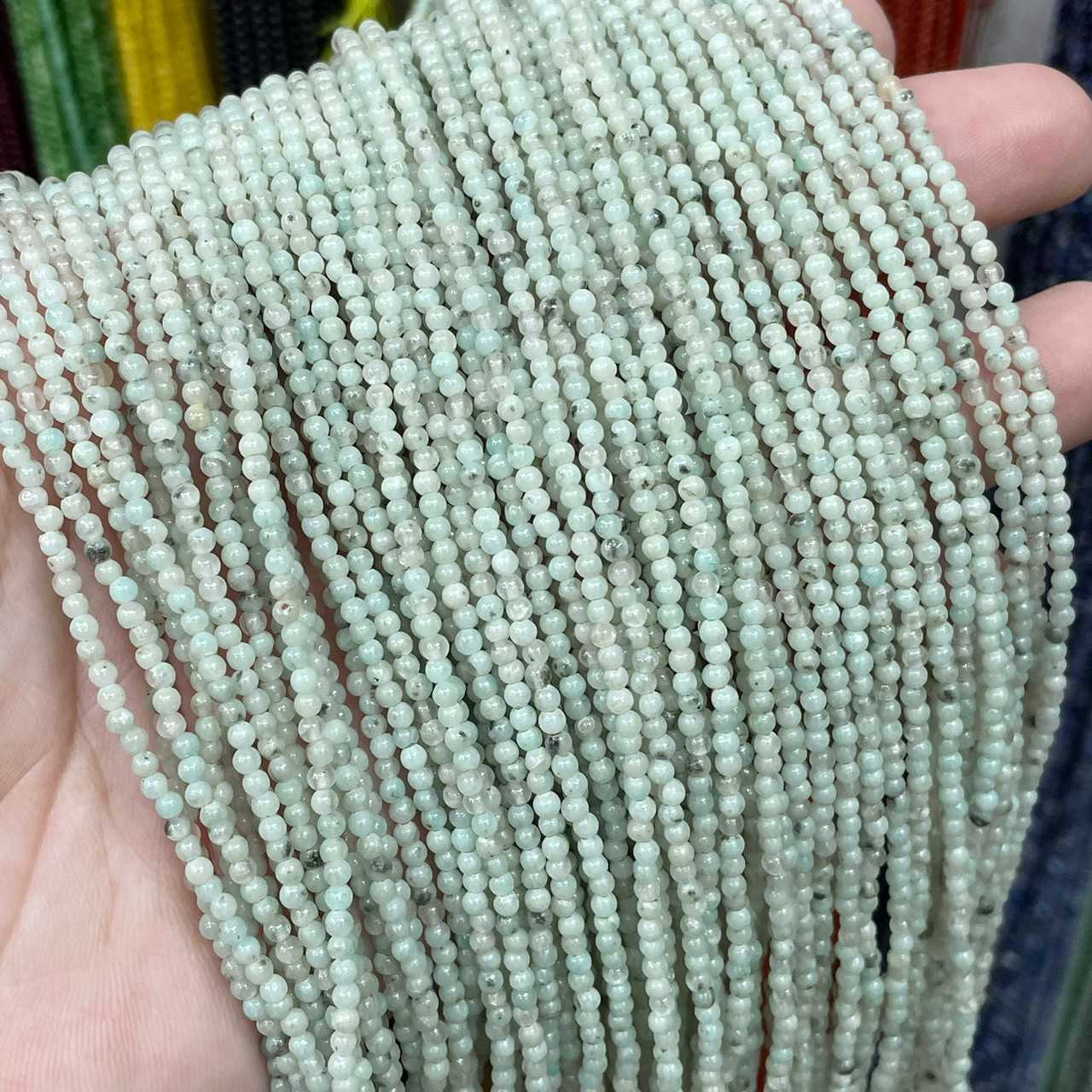 กีวี แจสเปอร์ (Kiwi Jasper) ขนาด 2 mm ทรงกลม เส้นยาว
