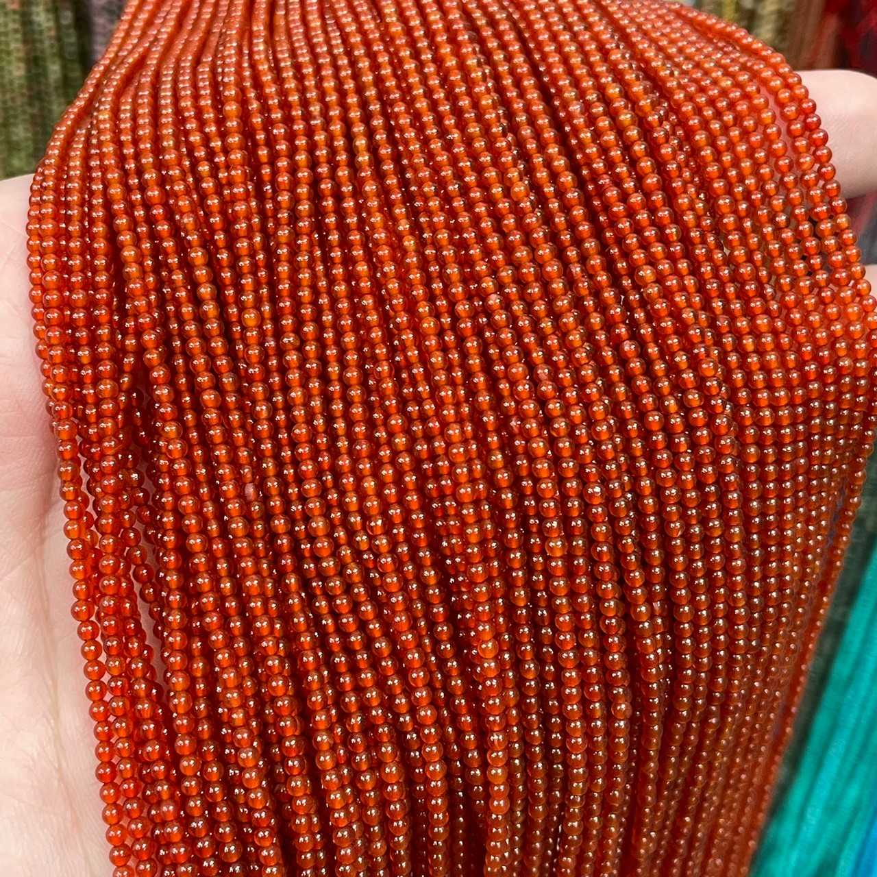 คาเนเลี่ยน (Carnelian) ขนาด 2 mm ทรงกลม เส้นยาว