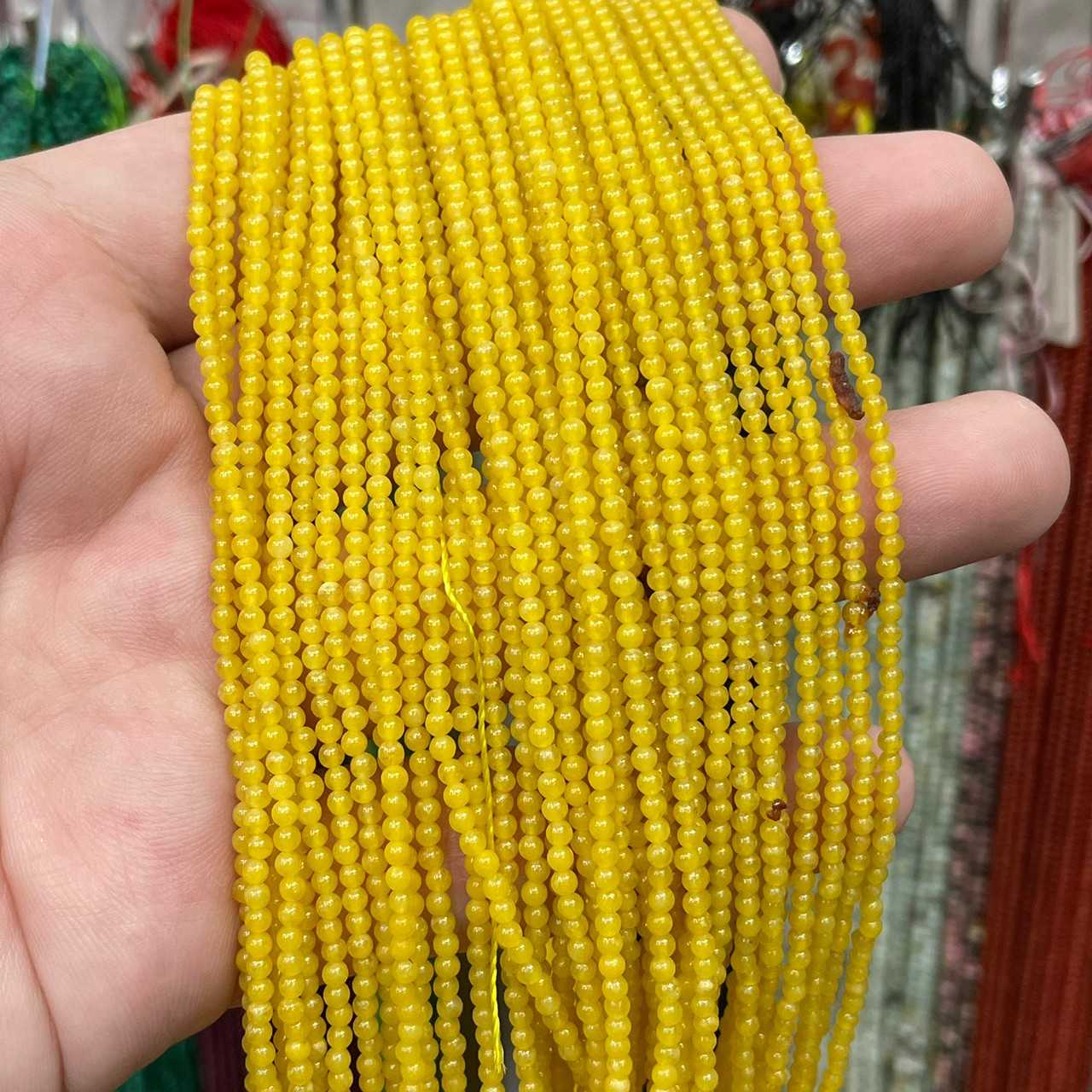 คาซิโดนี สีเหลือง (Yellow Chalcedony) ขนาด 2 mm ทรงกลม เส้นยาว