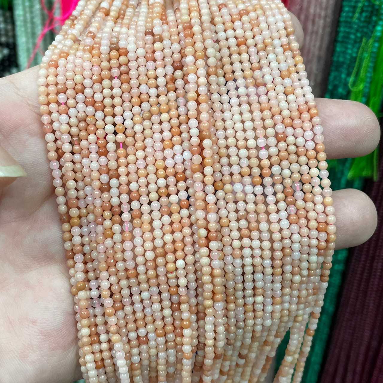 พิ้งค์ โอปอล (Pink Opal) ขนาด 2 mm ทรงกลม เส้นยาว