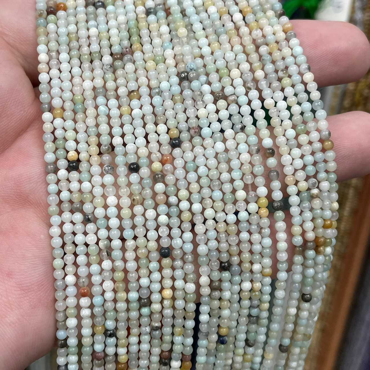 อมาโซไนท์ (Amazonite) ขนาด 2 mm ทรงกลม เส้นยาว
