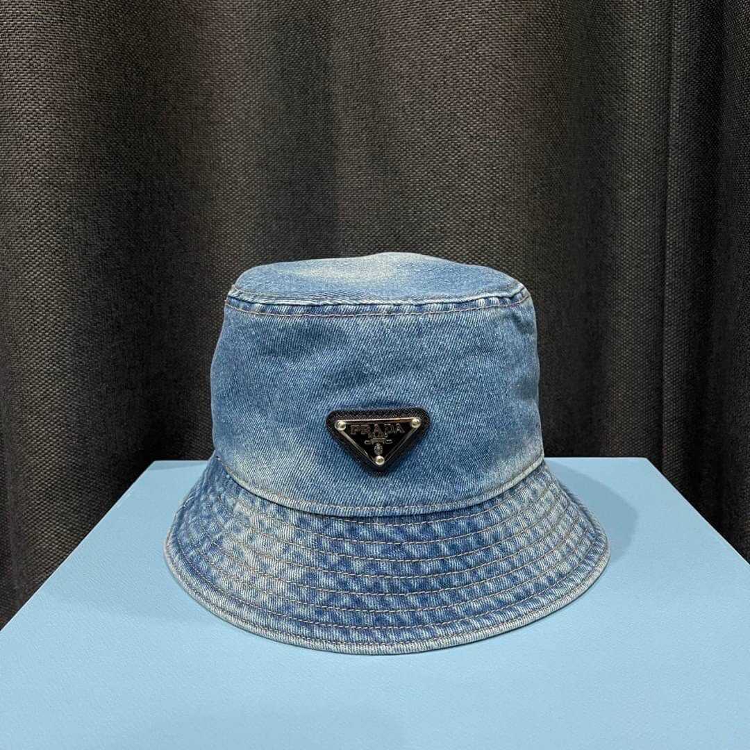 PRADA LIGHT BLUE DENIM TRIANGLE LOGO BUCKET HAT หมวกทรงบักเก็ต แบรนด์ปราด้า ผ้ายีนส์
