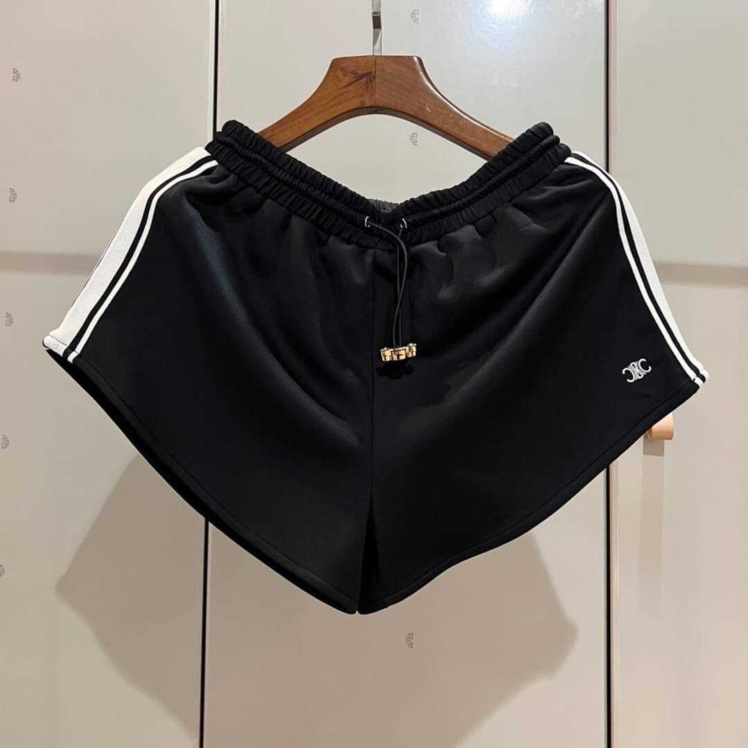 CELINE TRIOMPHE EMBROIDERED LOGO STRIPE SHORTS กางเกงขาสั้นเอวยางยืด แบรนด์ซีลีน สีดำ คาดแถบด้านข้าง