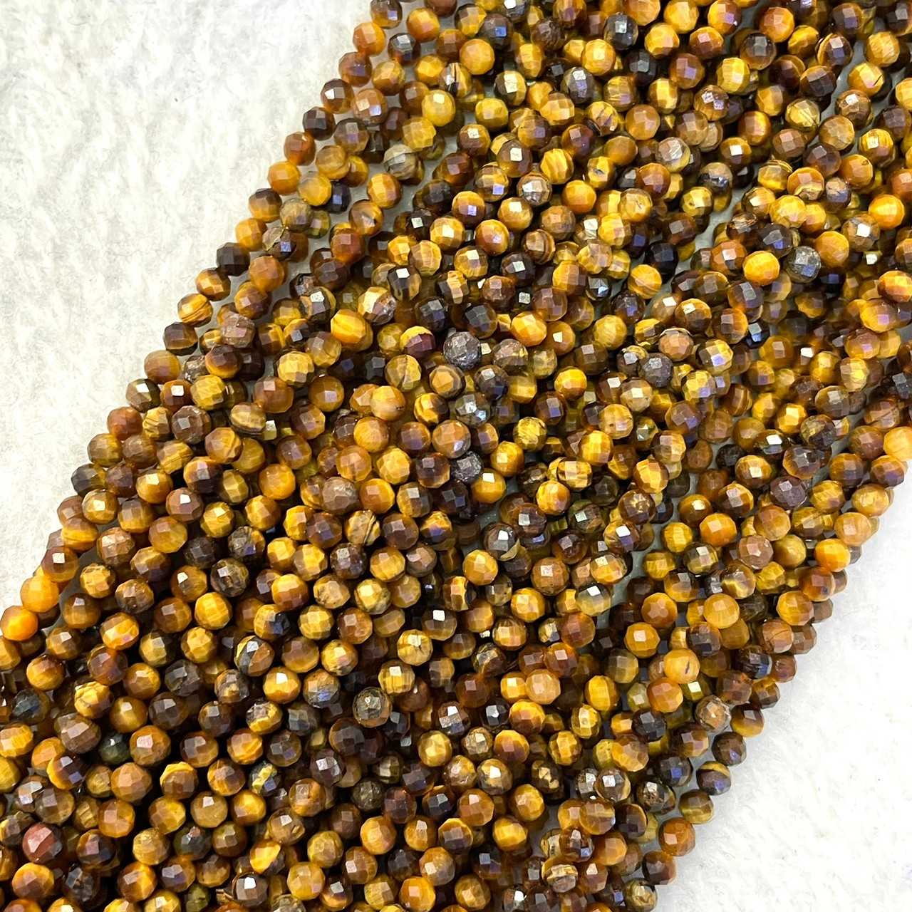 ตาเสือ สีเหลือง (Yellow Tiger's Eye) 3 mm เจียเหลี่ยม เส้นยาว
