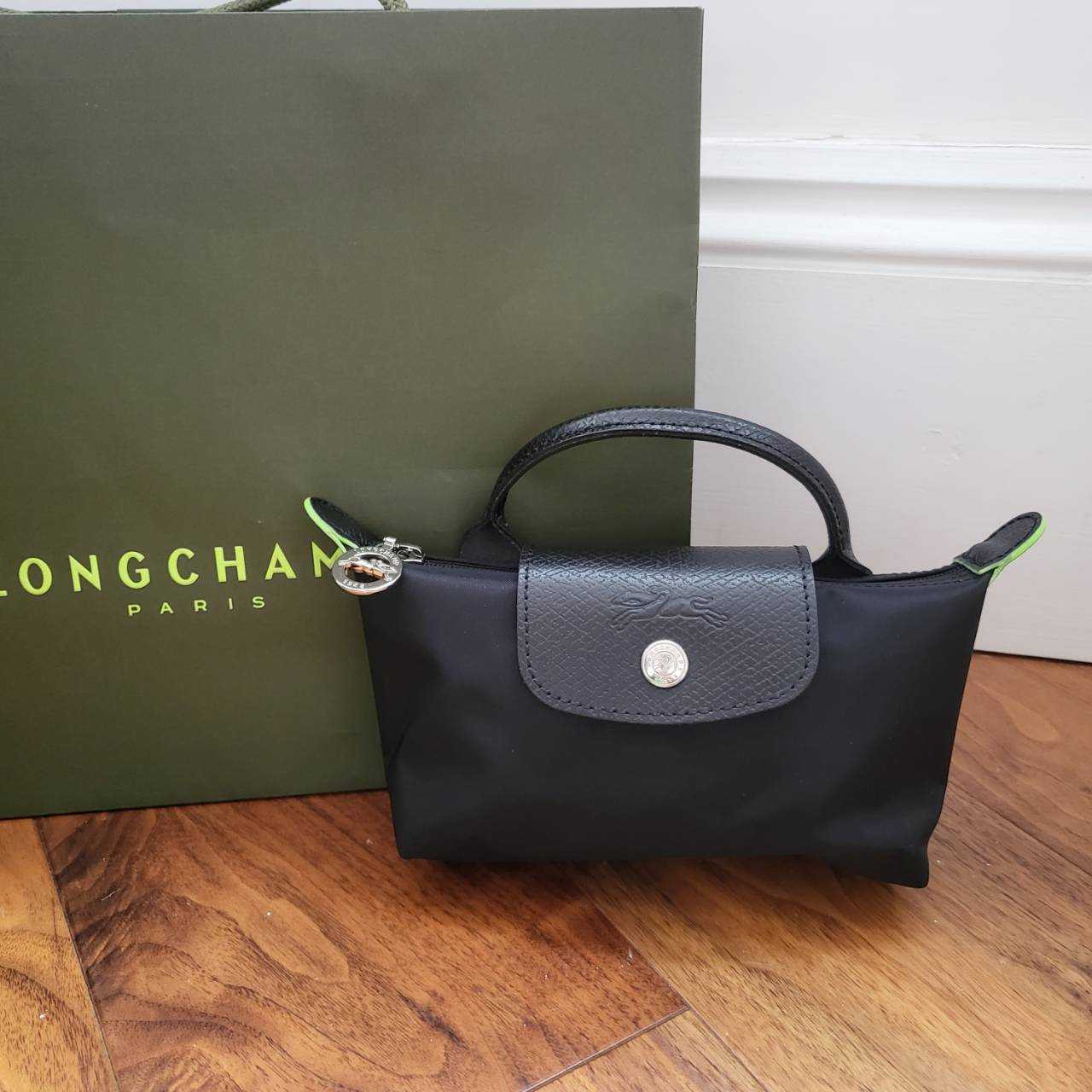 กระเป๋าถือ Longchamp รุ่น Extra Small Le Pliage Pouch Bag สีดำ