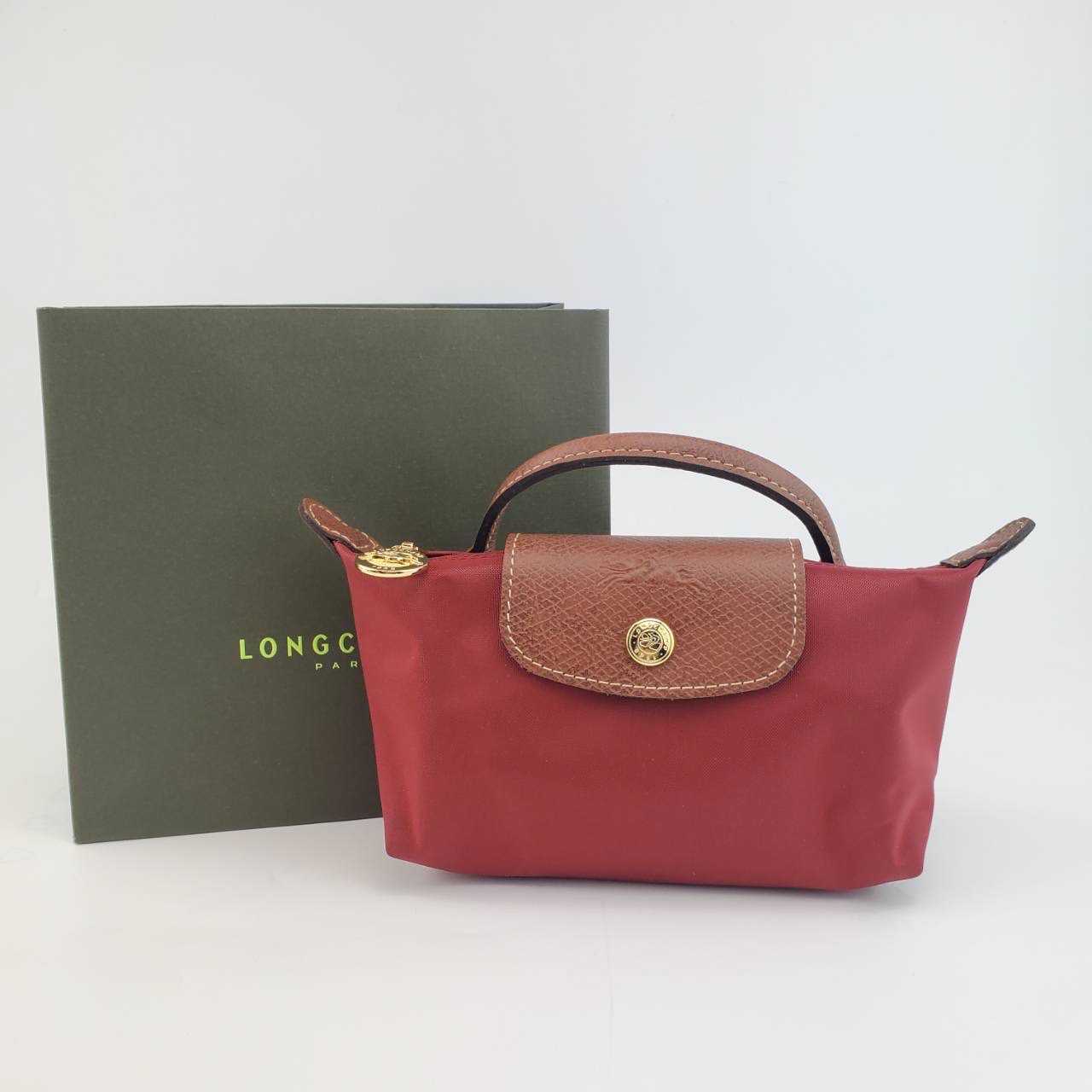 กระเป๋าถือ Longchamp รุ่น Extra Small Le Pliage Pouch Bag สีแดง