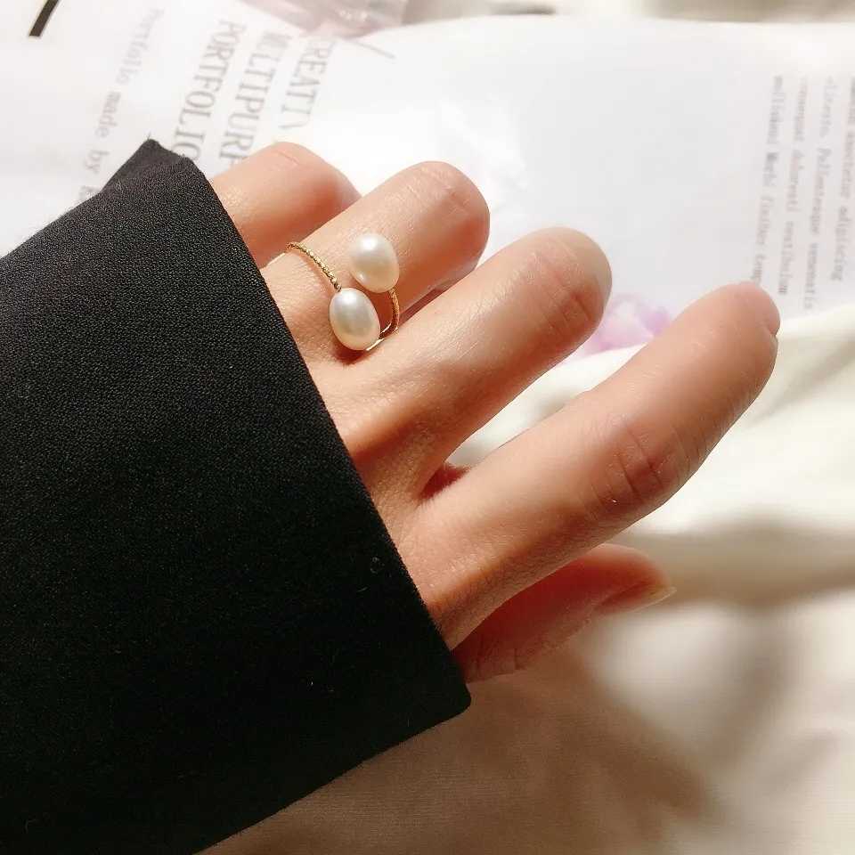 R013 free size double pearl ring 