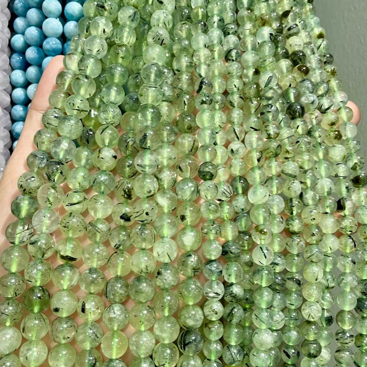 พีไนท์ / ไหมเขียว ( Prehnite ) ทรงกลม เส้นยาว