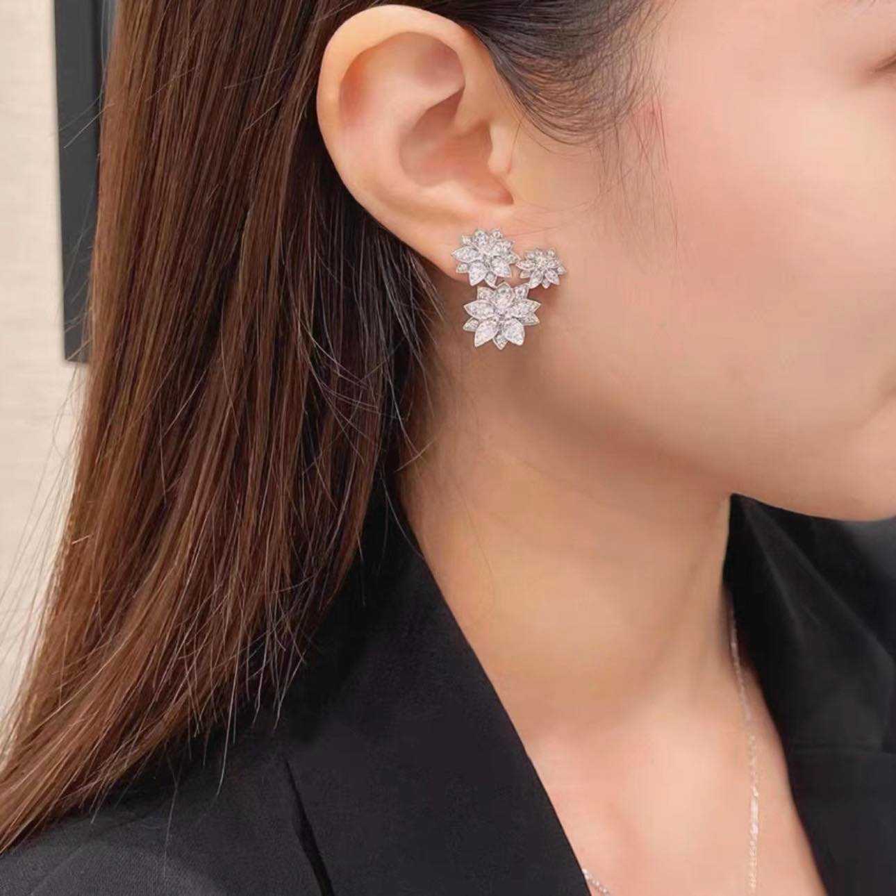 Three flower diamond earrings