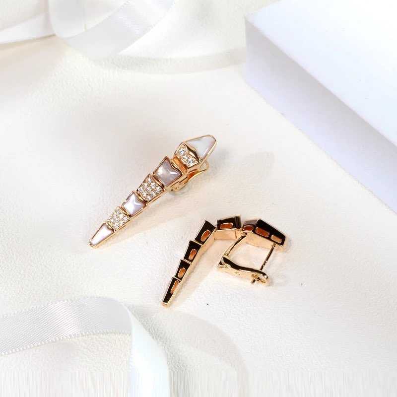 snake with pearl diamond earrings