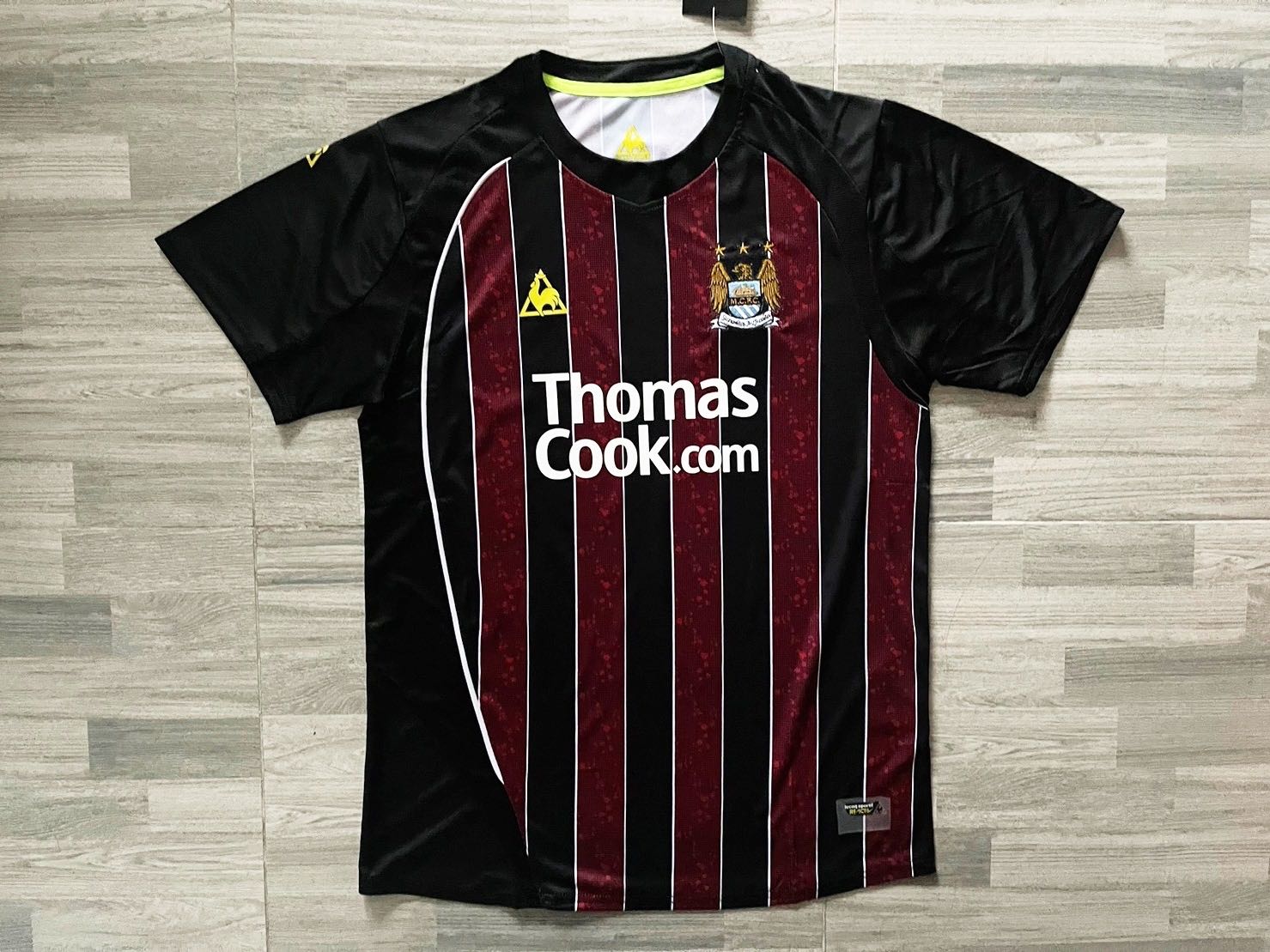 เสื้อย้อนยุคเเมนซิตี้ เกรดเเฟนบอล 