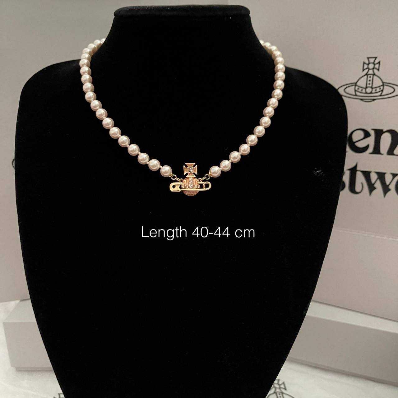 📌(ทักเชทก่อนสั่งซื้อ)   New Vivienne Westwood kitty pearl necklace ปรับได้40,42,44 cm