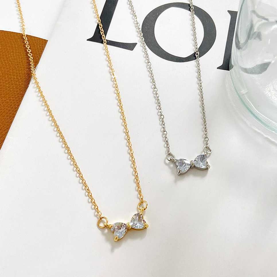 Mini Bow Necklace NSV03 สร้อยคอเงินแท้ 92.5 ตกแต่งจี้เพชร CZ โบ