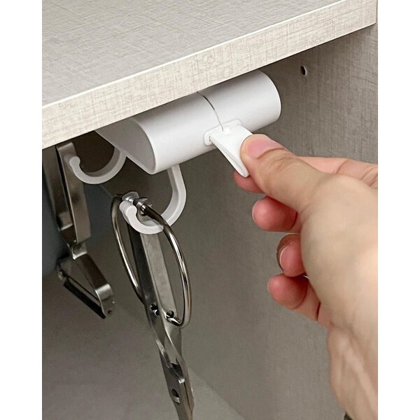 Sliding cookware holder