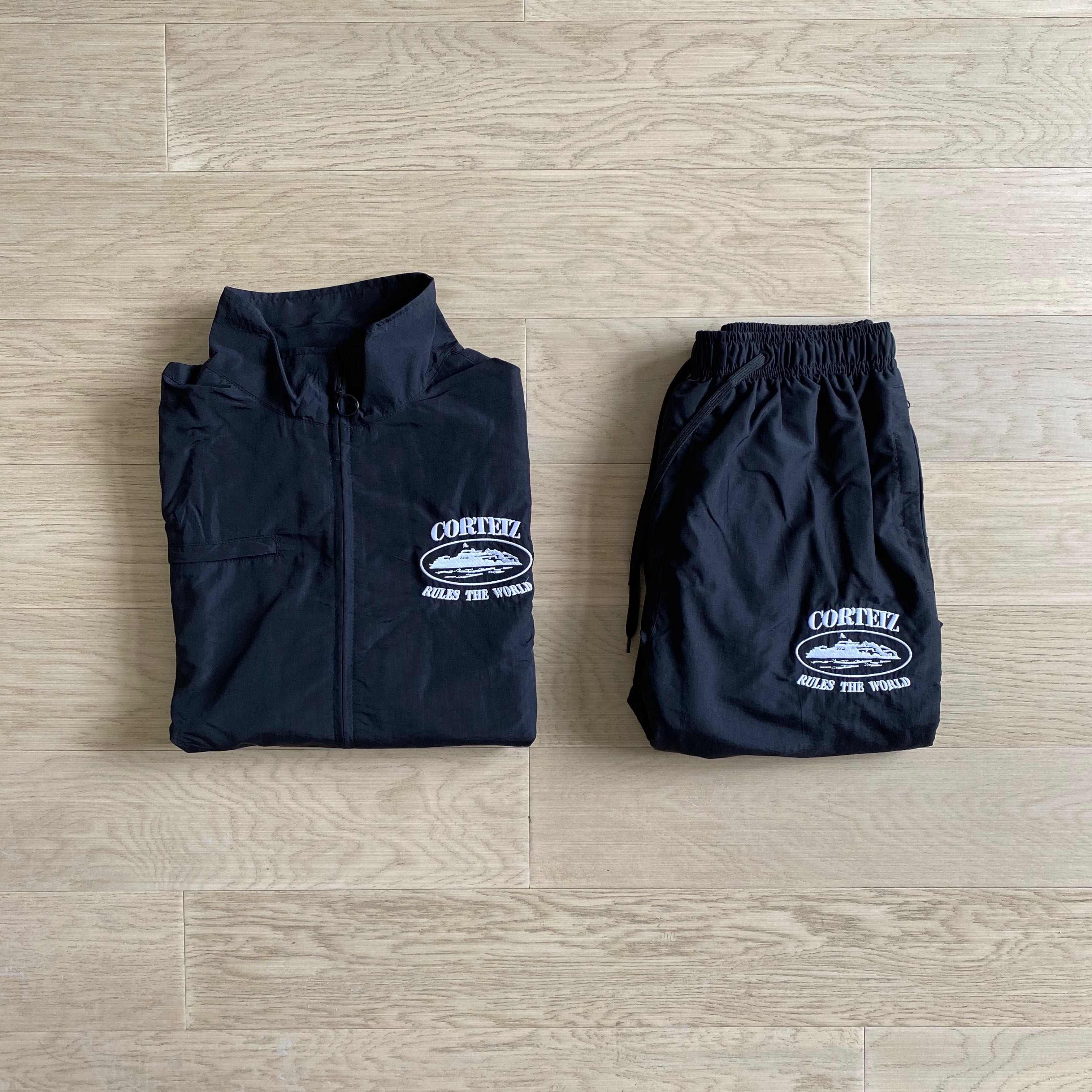 Corteiz Shukushuku Jacket + Bottoms  Black