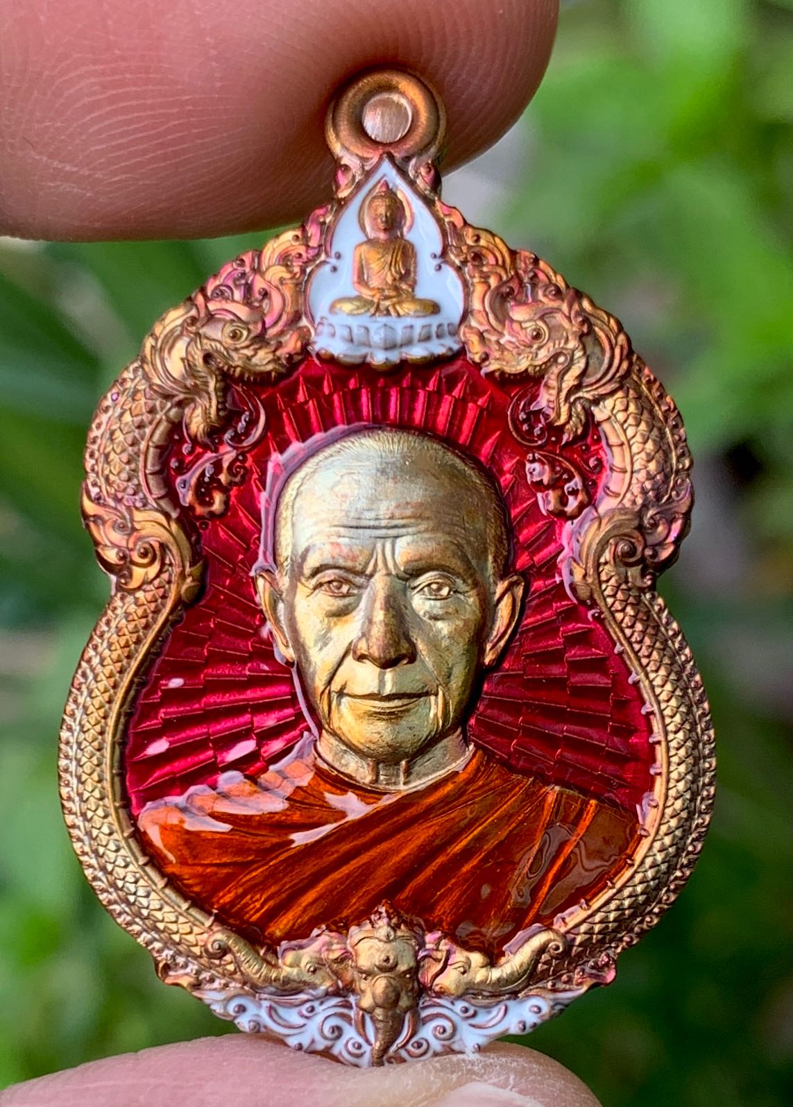 เหรียญเจ้าสัวพันล้านหลวงปู่จื่อเนื้อทองแดงรุ้งลงยา